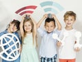 Diverse kids with internet icons Royalty Free Stock Photo