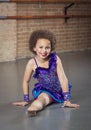 Diverse little dancer dancing at a dance studio