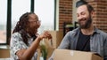 Diverse married couple getting house keys to move in Royalty Free Stock Photo