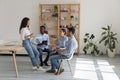 Diverse millennial business team meeting in modern office eco interior Royalty Free Stock Photo