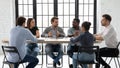 Diverse colleagues brainstorm discuss ideas at meeting Royalty Free Stock Photo