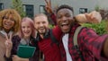 Diverse multiracial college university friends happy gen z multiethnic people teens students smiling record video blog Royalty Free Stock Photo