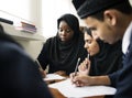 Diverse Muslim children studying in classroom Royalty Free Stock Photo