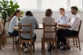 Diverse office business team talking sitting at table in boardroom Royalty Free Stock Photo