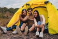 Diverse people of caucasian and asian friends having fun together traveling and camping at natural park in summer Royalty Free Stock Photo