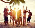 Diverse People Dancing and Partying on a Tropical Beach Royalty Free Stock Photo