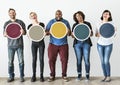 Diverse people holding blank round board Royalty Free Stock Photo