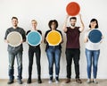 Diverse people holding blank round board Royalty Free Stock Photo
