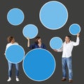 Diverse people holding colorful blank circles Royalty Free Stock Photo