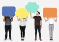 Diverse people holding empty speech bubbles Royalty Free Stock Photo