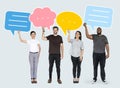 People holding colorful speech bubbles Royalty Free Stock Photo