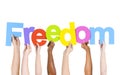 Diverse People Holding Word Freedom Royalty Free Stock Photo