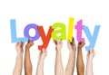 Diverse People Holding Word Loyalty Royalty Free Stock Photo