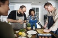 Diverse people joining cooking class Royalty Free Stock Photo