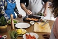 Diverse people joining cooking class Royalty Free Stock Photo