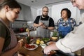 Diverse people joining cooking class Royalty Free Stock Photo