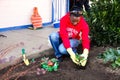 Diverse People performing Community Service gardening at local township school Royalty Free Stock Photo