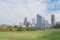 Diverse people playing football and outdoor activities at Eleanor Tinsley park downtown Houston