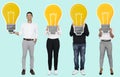 Diverse people showing light bulb icons Royalty Free Stock Photo