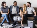 Diverse People sitting together enjoying music Royalty Free Stock Photo