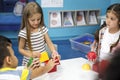 Diverse students at daycare playing Royalty Free Stock Photo