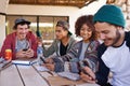 Diverse students, gen z and social media for university project using smartphone for research, networking and discussing Royalty Free Stock Photo