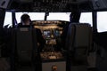 Diverse team of aircrew members using control command to fly plane