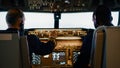 Diverse team of aviators preparing to takeoff with airplane Royalty Free Stock Photo