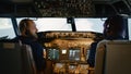Diverse team of captain and copilot using dashboard command Royalty Free Stock Photo