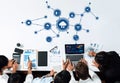 Collaborative Computing in a Modern Workspace Featuring Technology and Data Analysis Elements Including Graphs and Cloud Royalty Free Stock Photo
