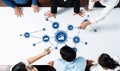 Diverse Team Collaborating on Business Strategy and Data Analysis with Visual Connections and Graphical Representations Royalty Free Stock Photo
