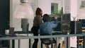 Diverse team of database admins analyzing source code and comparing data script Royalty Free Stock Photo