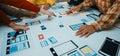 Collaborative Design Session for Mobile Application with Diverse Team Engaging in Brainstorming, Planning, and Creative Royalty Free Stock Photo
