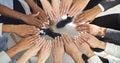 Diverse team of people joining hands in circle as illustration of teamwork and support Royalty Free Stock Photo