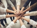 Diverse team\'s hands stacked, symbolizing unity and collaboration Royalty Free Stock Photo