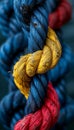 Diverse team strength united by ropes on colorful background, symbolizing teamwork and cooperation. Royalty Free Stock Photo