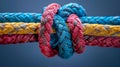 Diverse team strength unity through colorful network of ropes, partnership, and communication Royalty Free Stock Photo