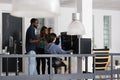 Diverse team of web developer analyzing html code on terminal window,