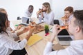 Diverse team workers eating pizza Royalty Free Stock Photo