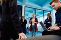A diverse team of young business people exchanging ideas in a modern startup office Royalty Free Stock Photo