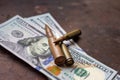 Diverse weapon bullets on American dollars background. Military industry, war, global arms trade and crime concept. Royalty Free Stock Photo