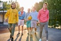 Diverse young city boys are ready to play basketball together