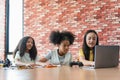 Diverse Young Girls Working Together on Programming and STEM Project, Multicultural Students Learning Coding and Robotics on Royalty Free Stock Photo