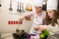 Diverse young people at team building cooking class