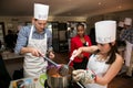 Diverse young people at team building cooking class