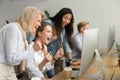 Multiracial happy businesswomen celebrating victory together loo Royalty Free Stock Photo