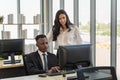 Diversity Business and Team Work concept. African businessman and businesswoman team colleague working  with desktop computer in Royalty Free Stock Photo