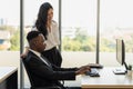 Diversity Business and Team Work concept. African businessman and businesswoman team colleague working  with desktop computer in Royalty Free Stock Photo