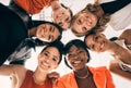 Diversity, circle and low angle portrait of businesswomen in a huddle at a team building meeting. Happy, confidence and Royalty Free Stock Photo