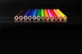 Diversity concept. row of mix color pencil on black background with text Diversity, Ethnicity, Equality, Age, Sexual Orientation Royalty Free Stock Photo